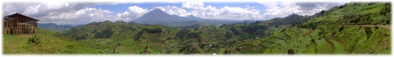 Farming in this area requires much effort and terraced fields. Mount Muhabura in the distant centre